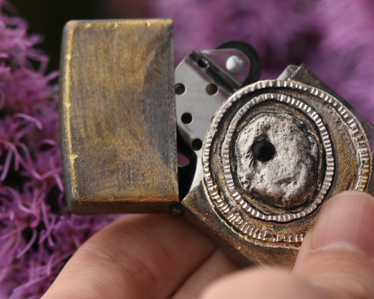 One of One—An Eye & A Flame Lighter