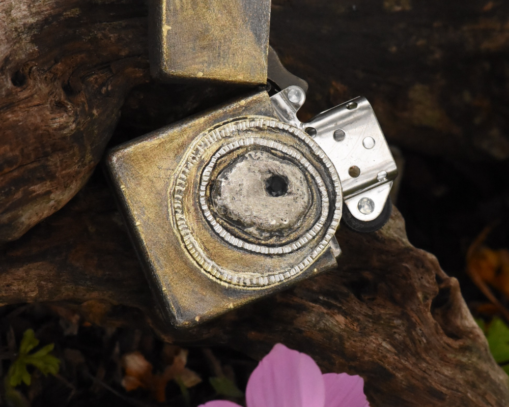 One of One—An Eye & A Flame Lighter