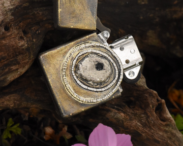 One of One—An Eye & A Flame Lighter