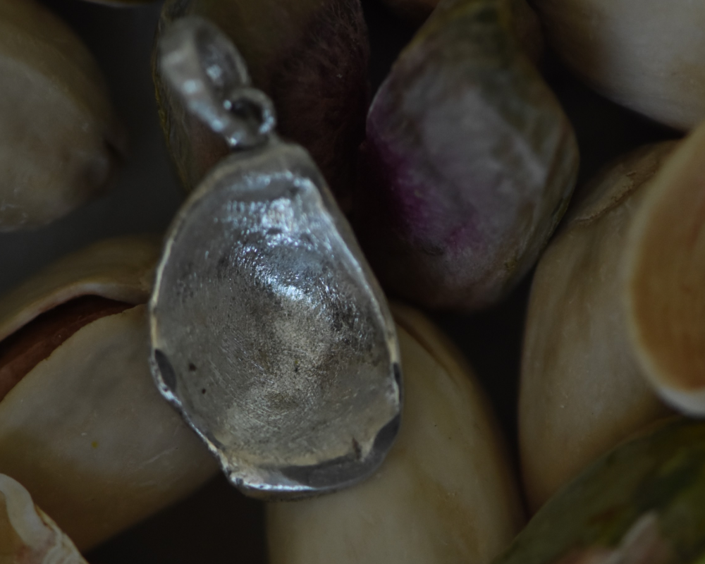 One of One—A Pistachio Shell in Paris Charm