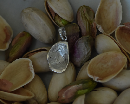 One of One—A Pistachio Shell in Paris Charm