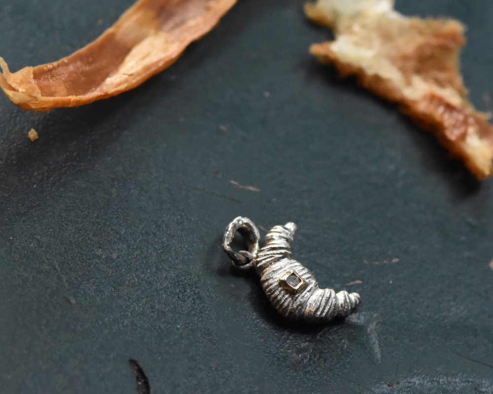 One of One—Croissant With A Pat of Diamond Butter