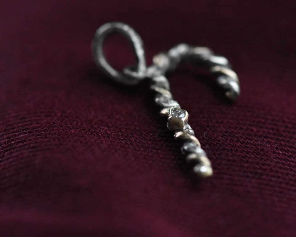 One of One— Itty Bitty Candy Cane Charm